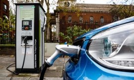 An electric car charging on a London street